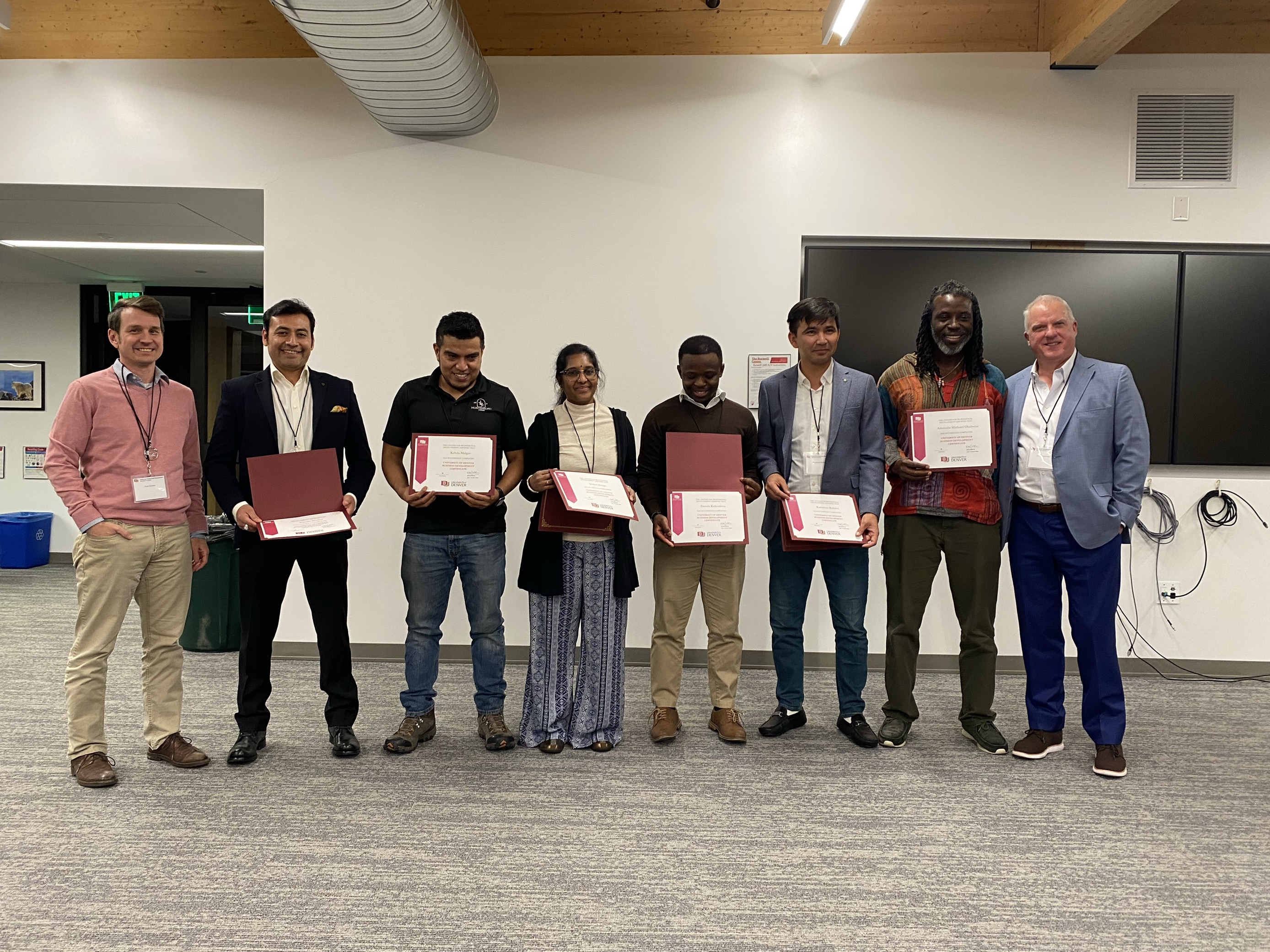 group of students with certificates